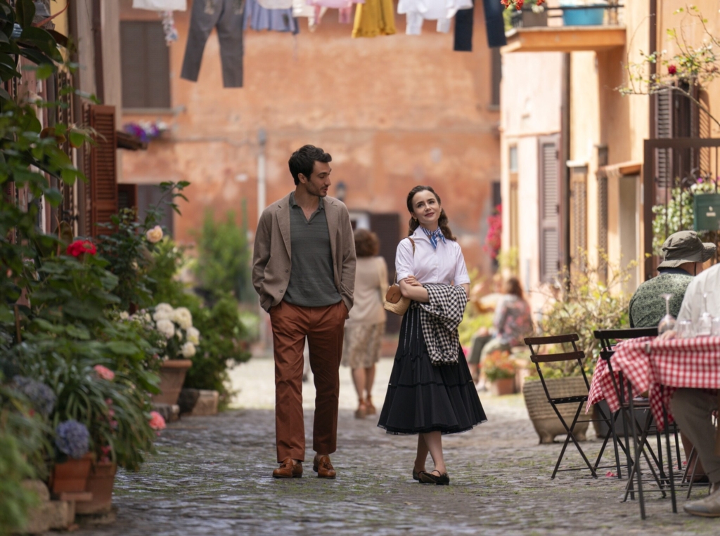 Rome: Emily in Paris. (L to R) Eugenio Franceschini as Marcello, Lily Collins as Emily in episode 410 of Emily in Paris. Cr. Giulia Parmigiani/Netflix © 2024